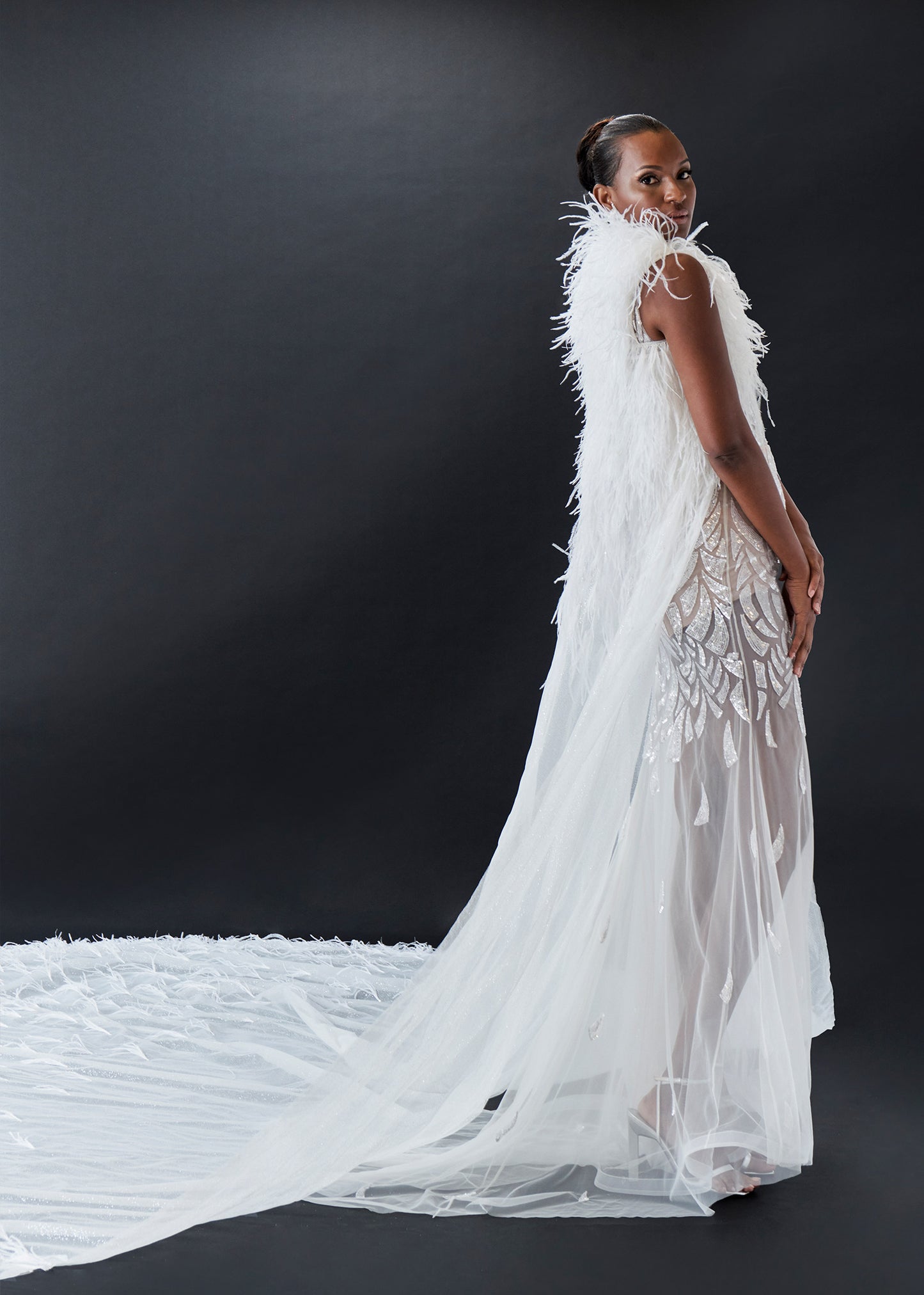 Royal Tufted Cape and Feather Details | Lotus Threads Bridal