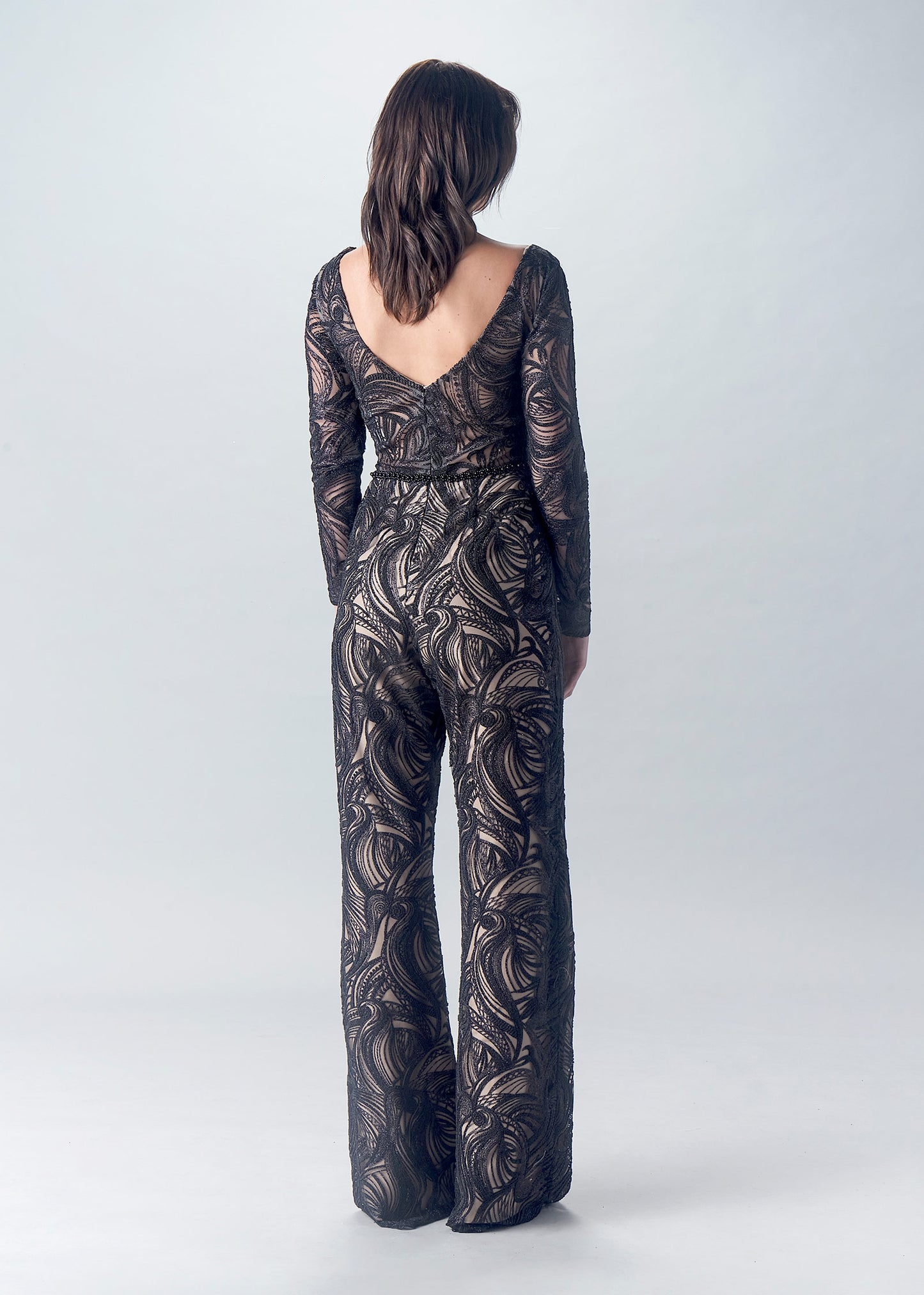 Deep V-Neckline Jumpsuit with Sheer Flared Pants