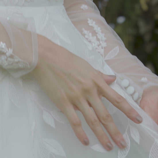 Elegant Long Sleeve Bustier A-line Wedding Dress with Floral Beading | Lotus Threads Bridal